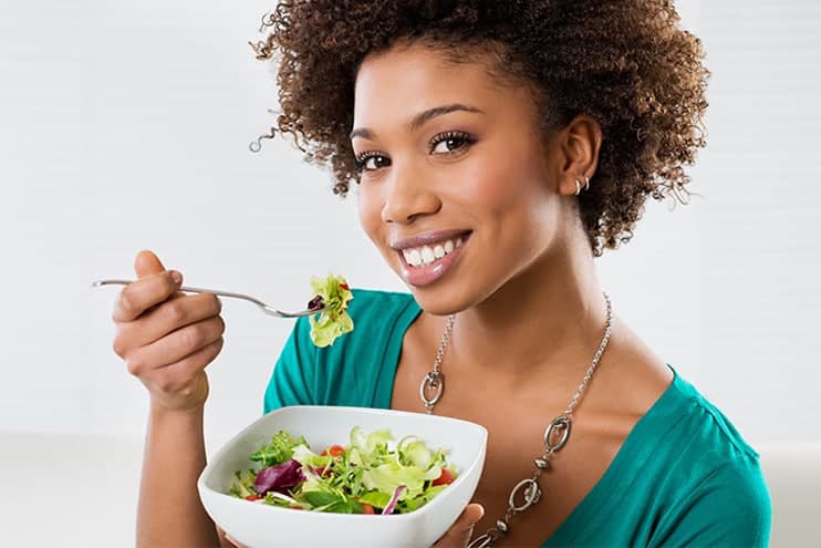 Healthy Woman Eating A Salad